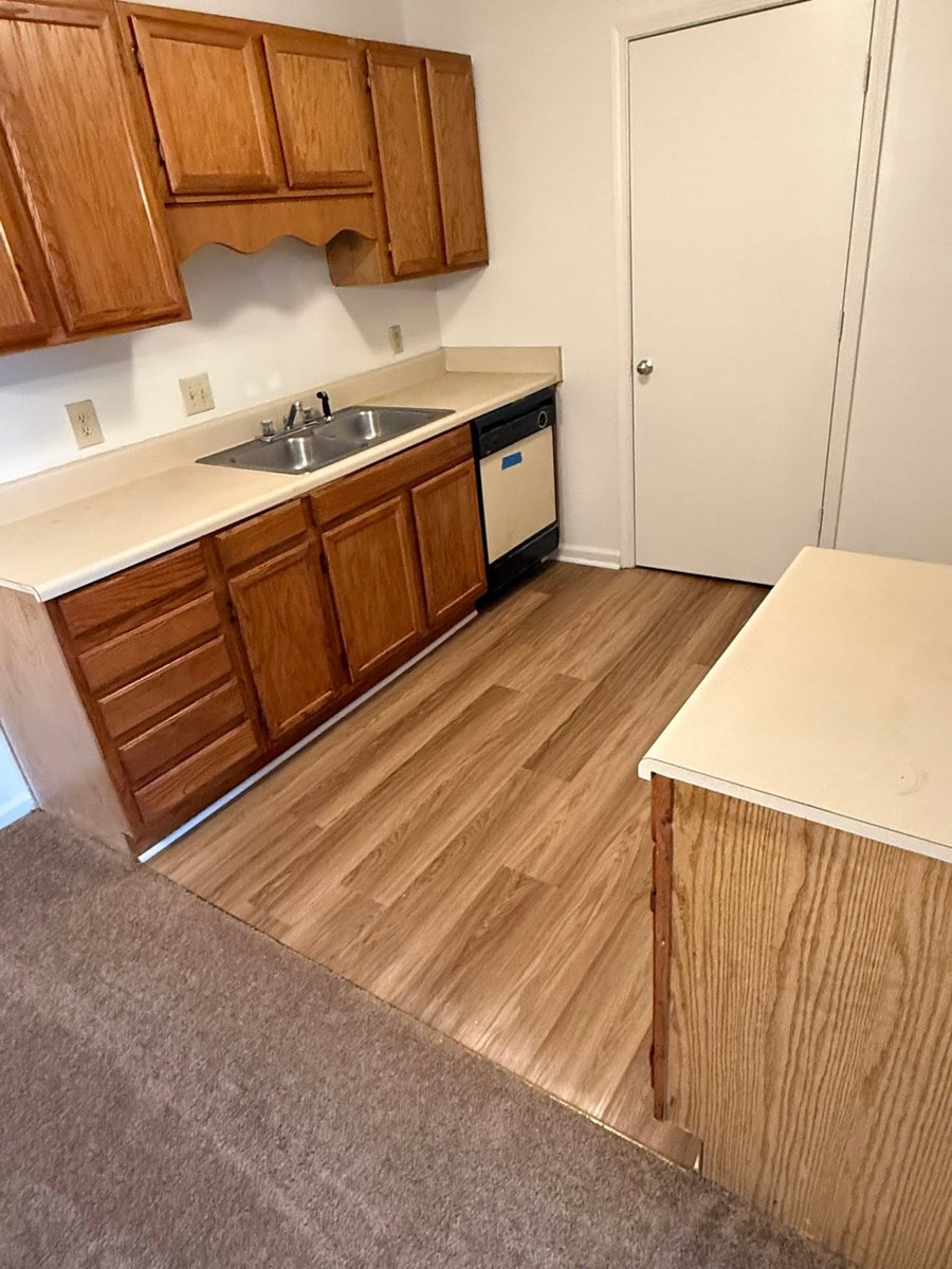 Vacant apartment kitchen cleaned and ready for the next resident